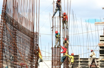 people-working-on-building-during-daytime.jpg people working on building during daytime