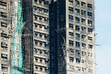 skyscraper-damaged-by-fire-with-scaffolding-and-netting.jpg Skyscraper damaged by fire with scaffolding and netting