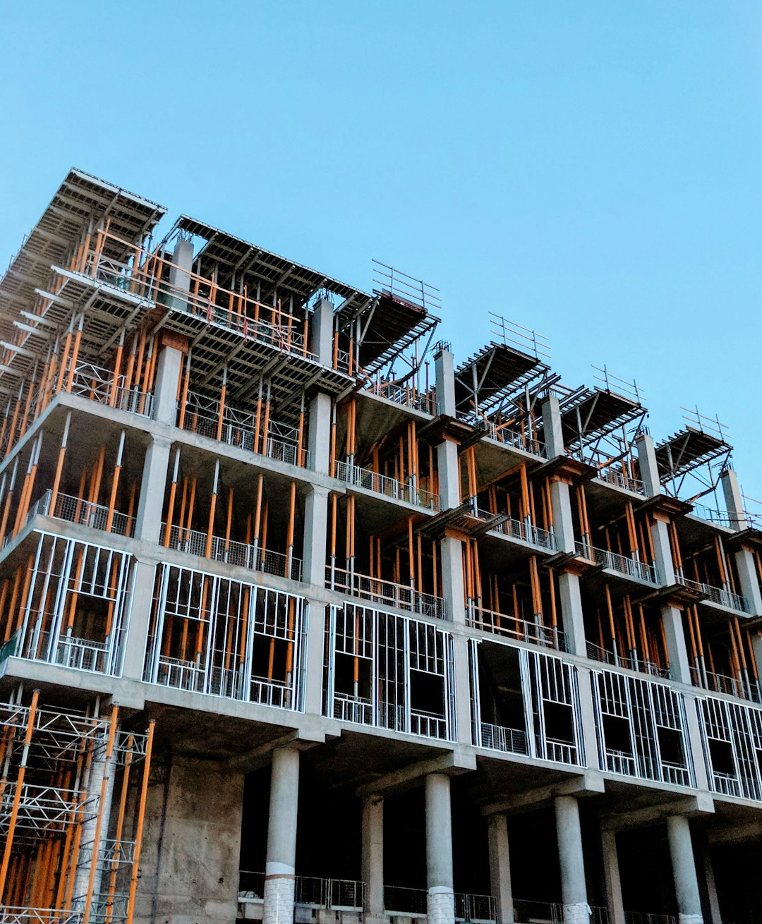 gray-concrete-building-under-construction.jpg gray concrete building under construction